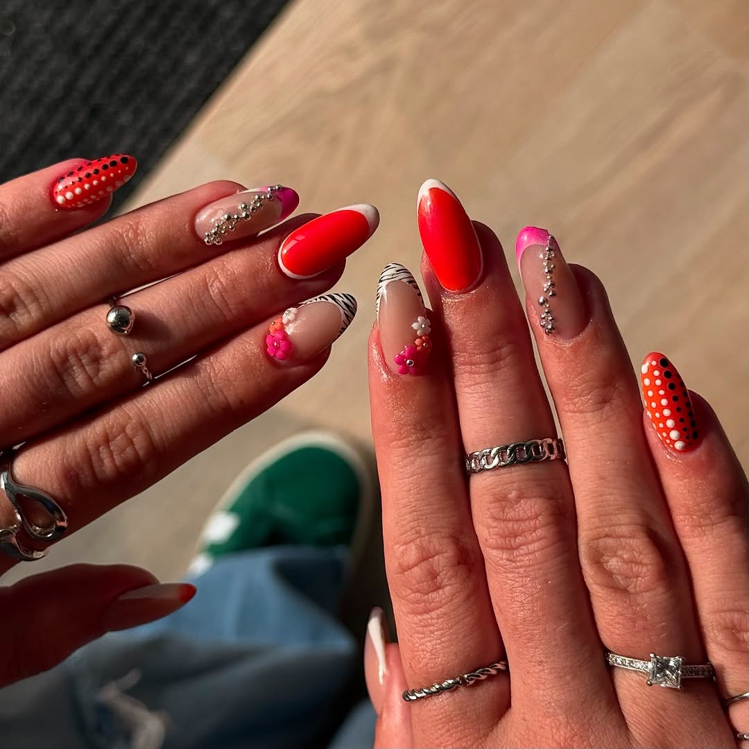 Vibrant Mismatched French Tips with Polka Dots and Flowers