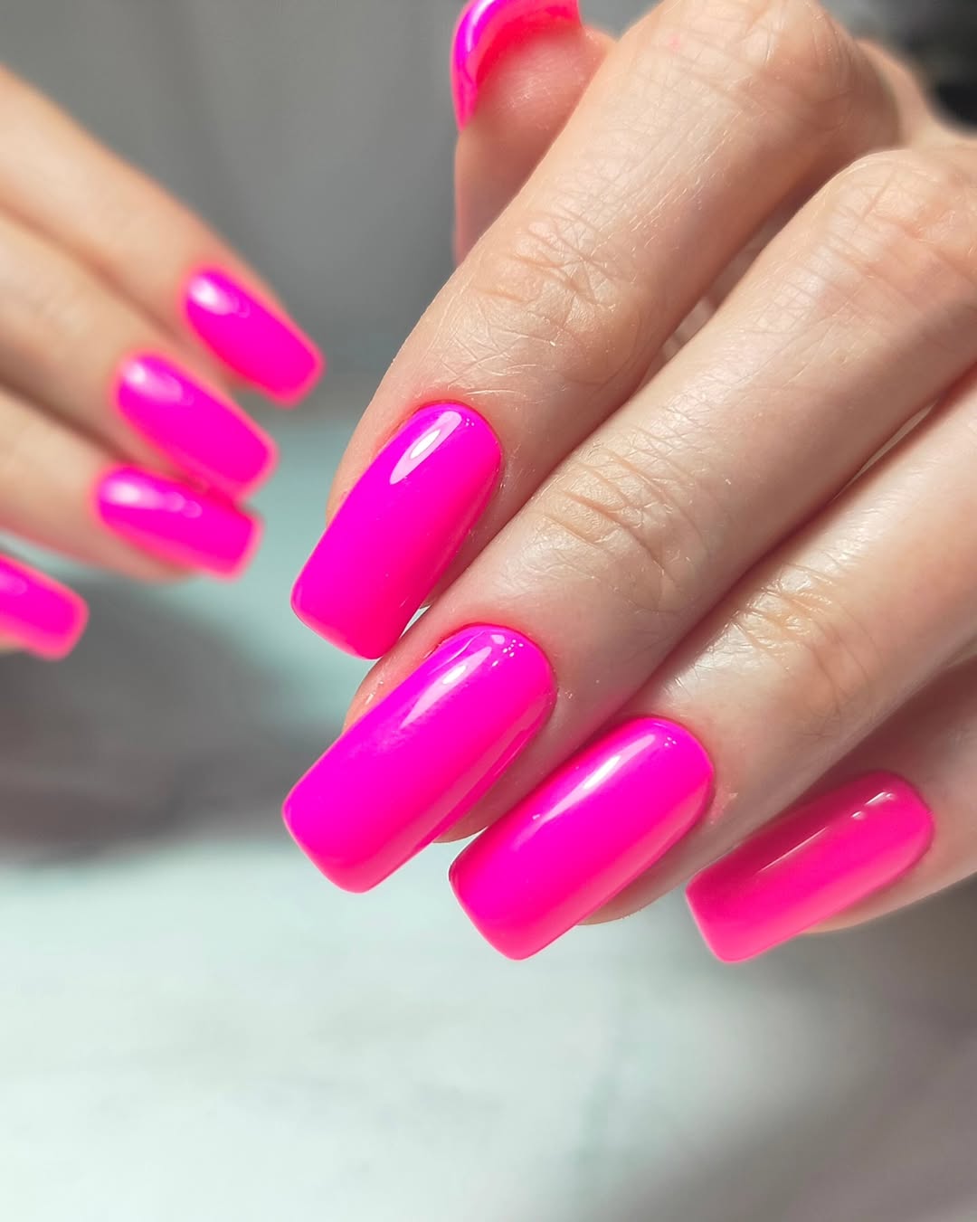 Vibrant Neon Pink Glossy Rounded Square Summer Nails