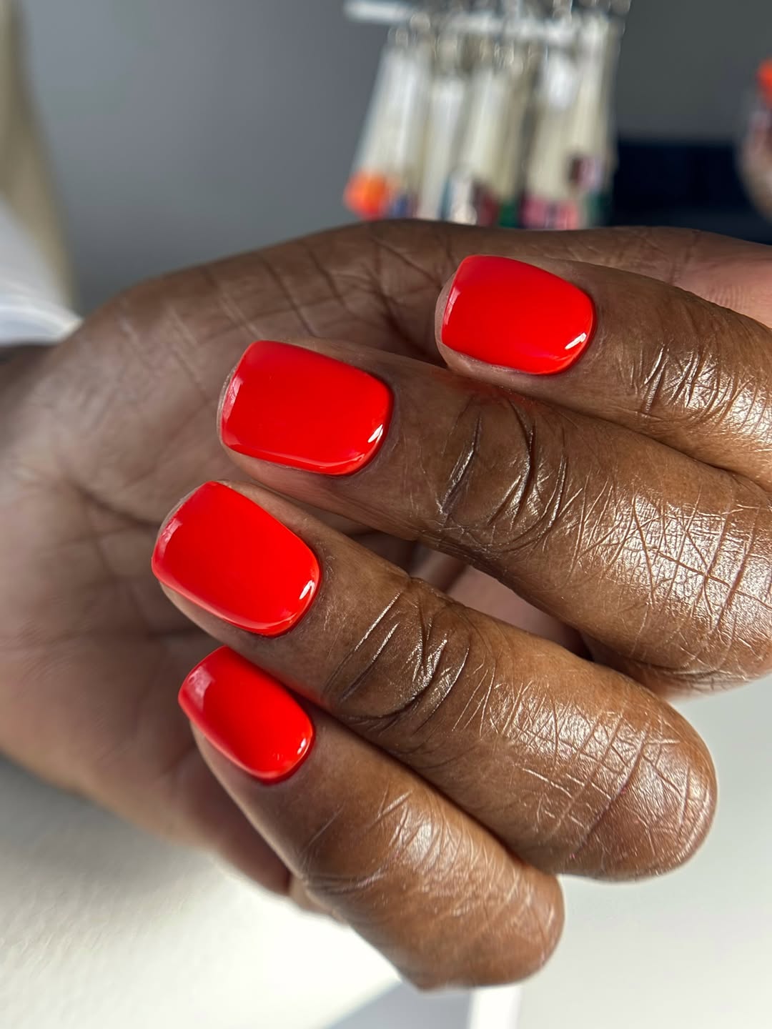 Vibrant Neon Red Glossy Short Round Nails