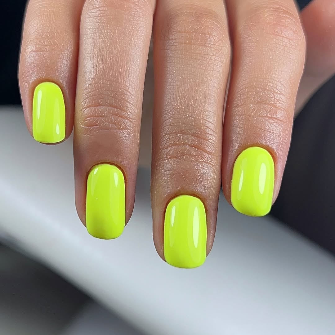 Vibrant Neon Yellow Glossy Short Round Nails