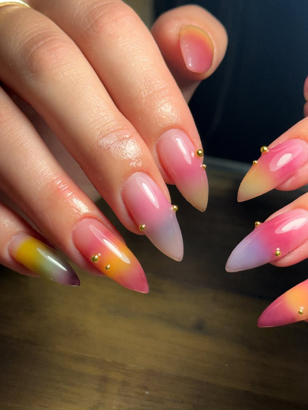Vibrant Ombre Stiletto Nails With Gold Studs