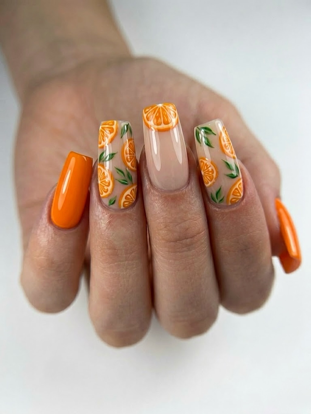 Vibrant Orange Citrus Slice Nail Art