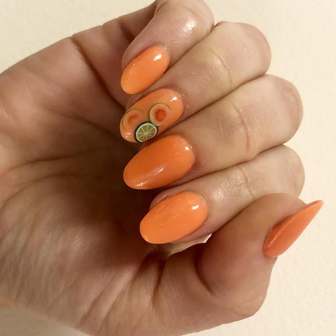 Vibrant Orange Gel Almond Nails With Fruit Decals