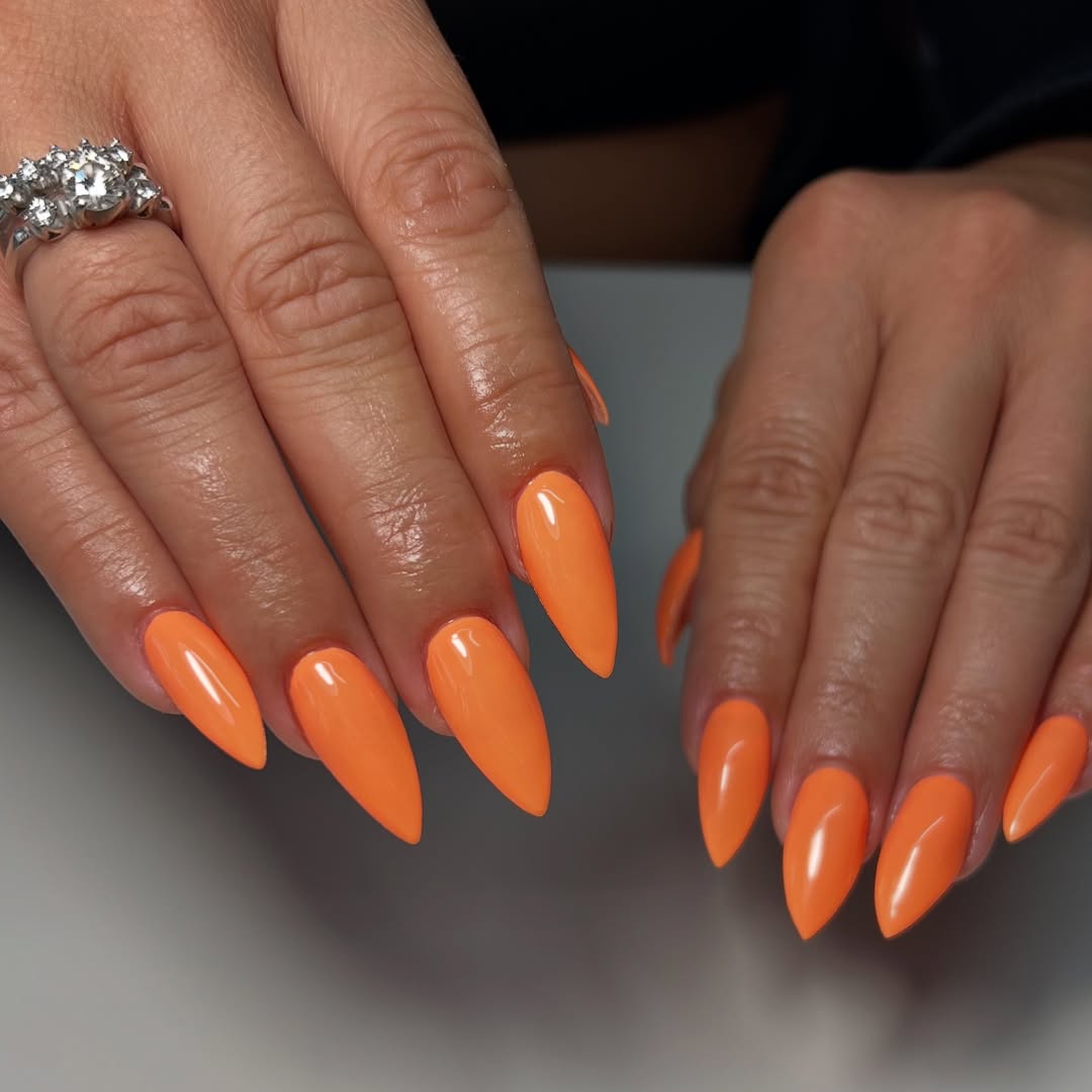 Vibrant Orange Glossy Stiletto Gel Nails