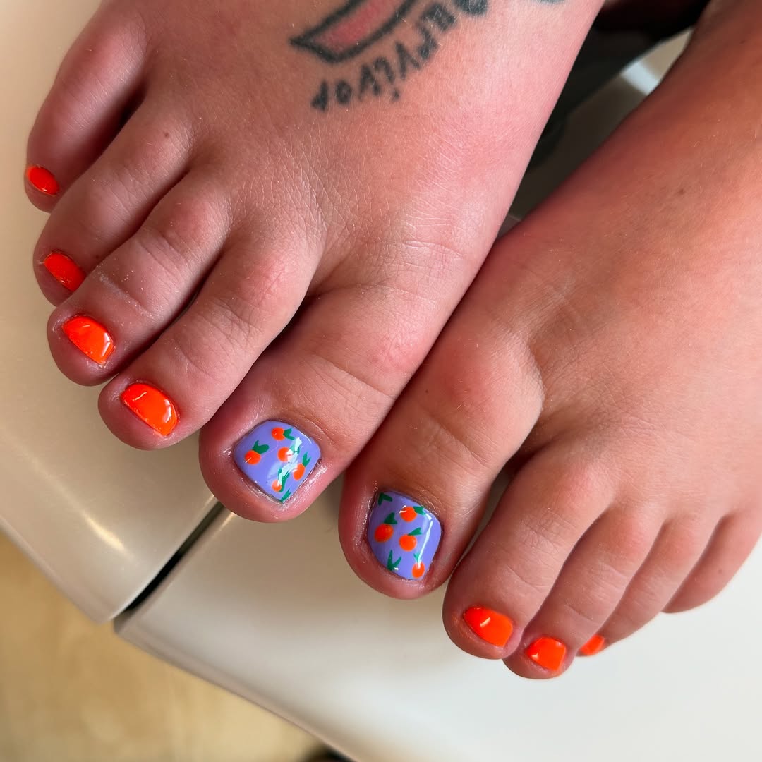 Vibrant Orange Pedicure With Lavender Citrus Art