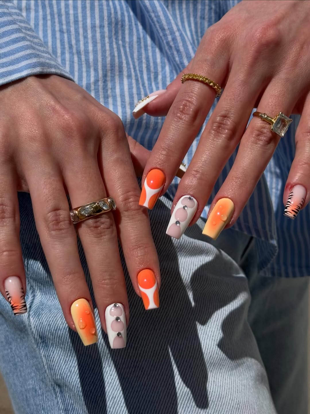 Vibrant Orange Swirl French Tips with Tiger Stripes
