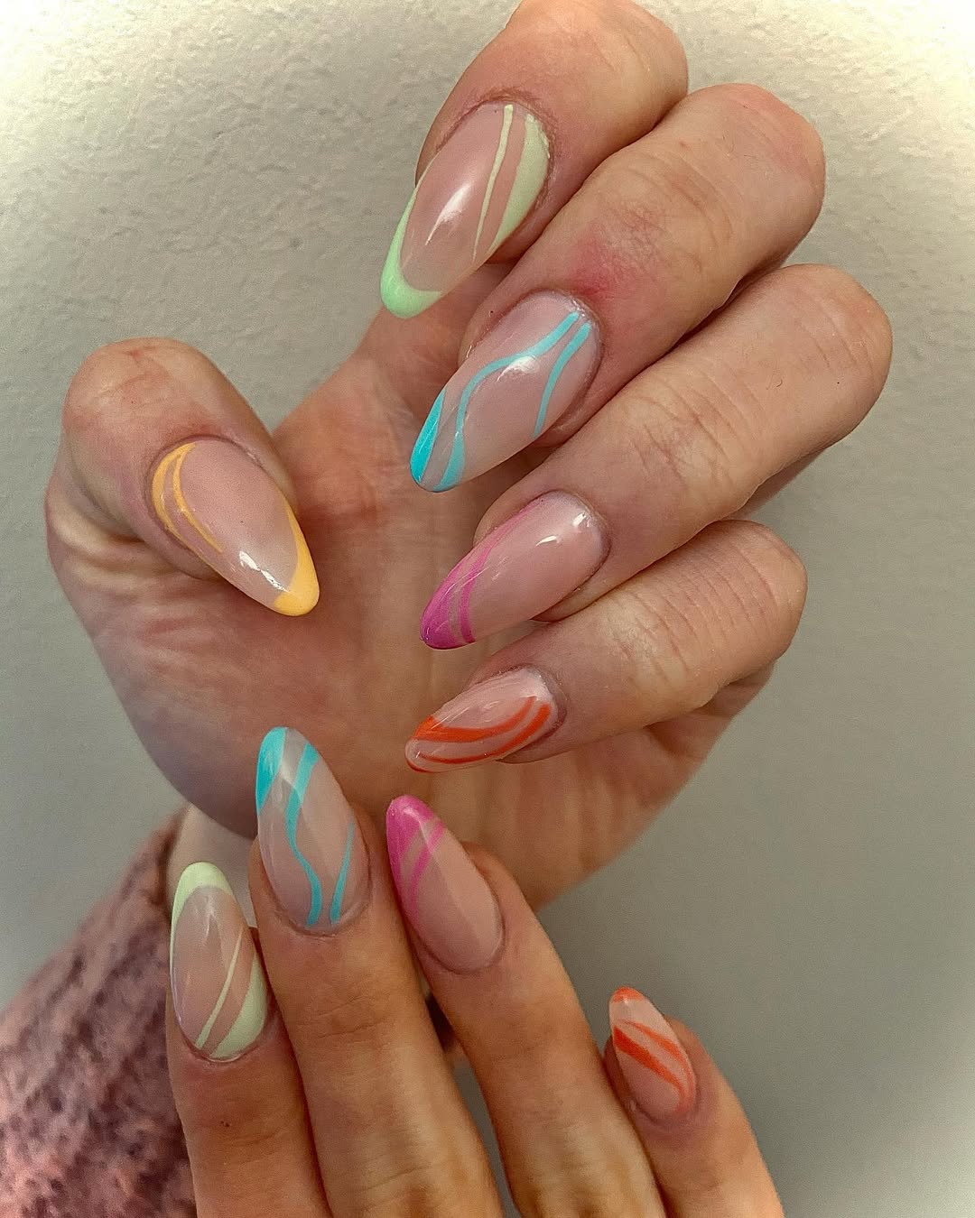 Vibrant Pastel Swirl Accent Almond Nails