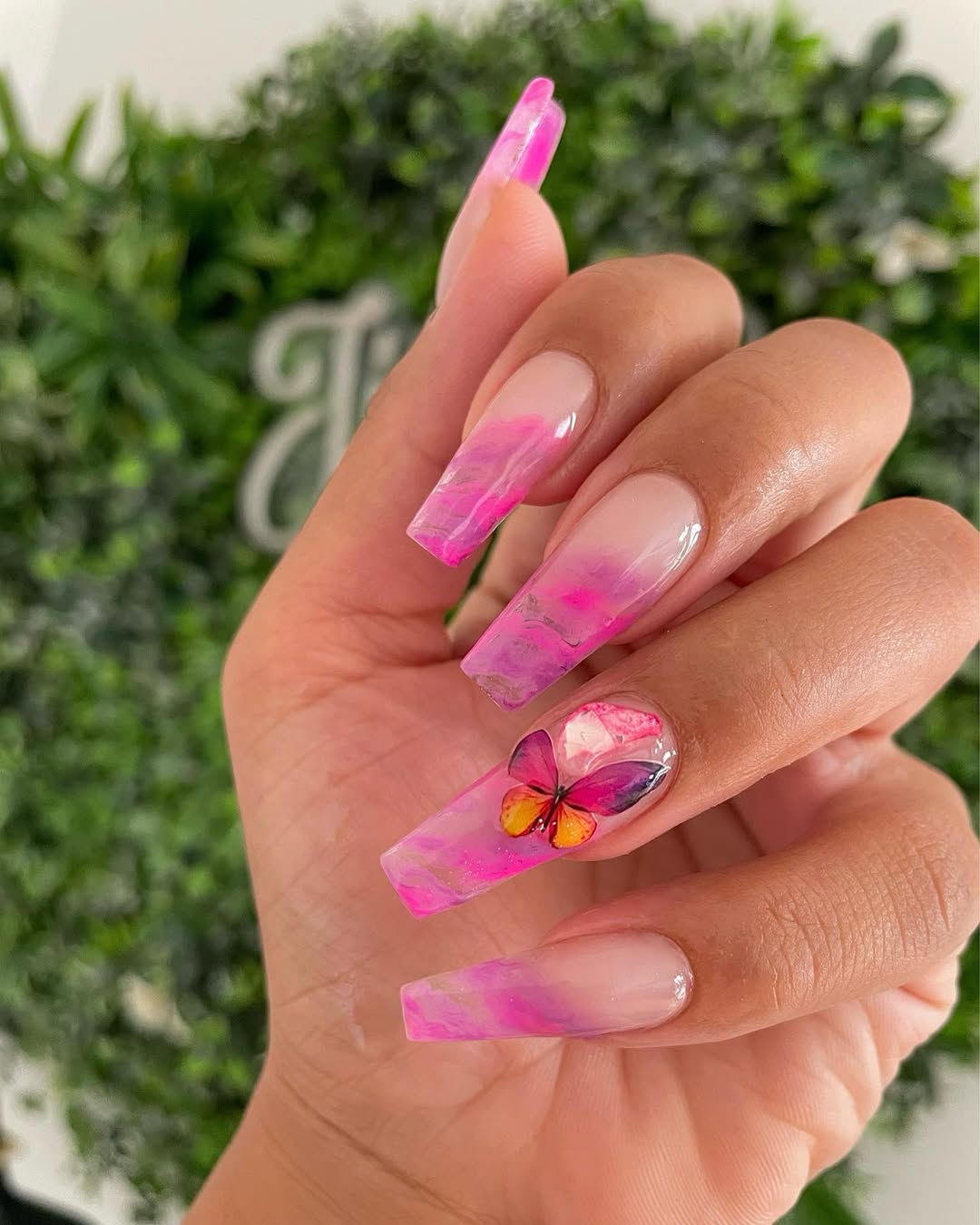 Vibrant Pink Marble Coffin Nails With Butterfly Art