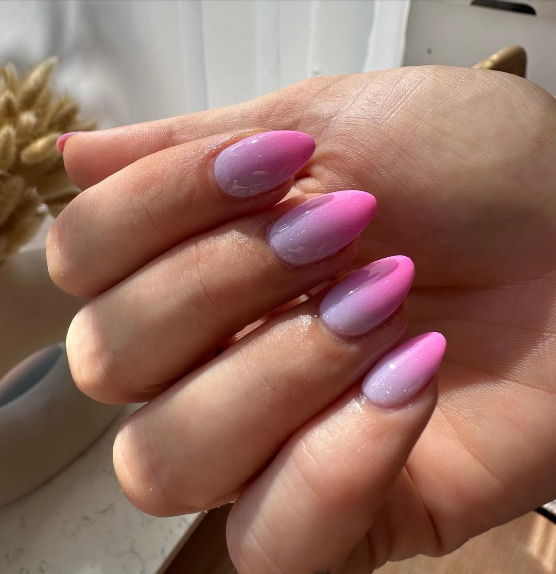Vibrant Pink to White Ombré Almond Nails