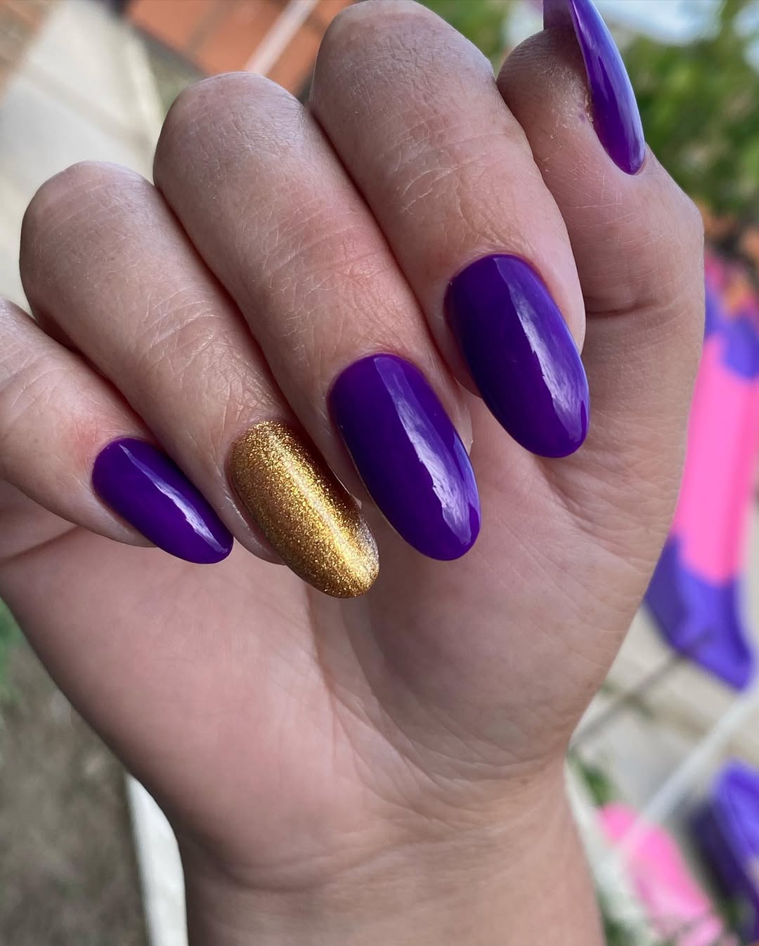 Vibrant Purple and Shimmer Gold Almond Nails