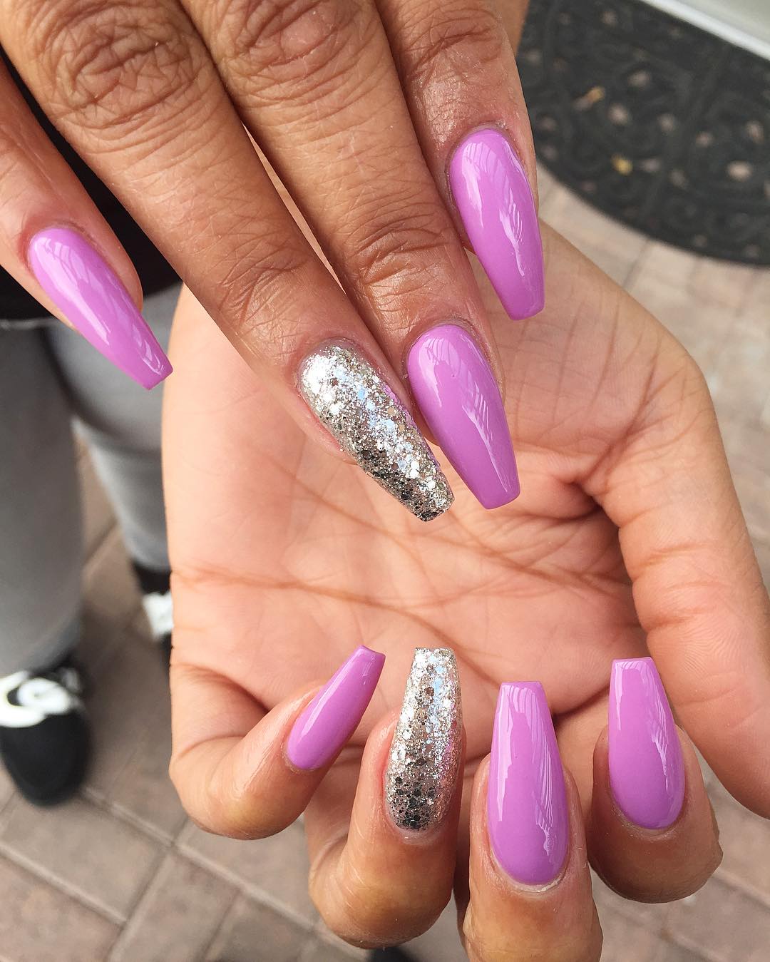 Vibrant Purple Coffin Nails with Silver Glitter Accent