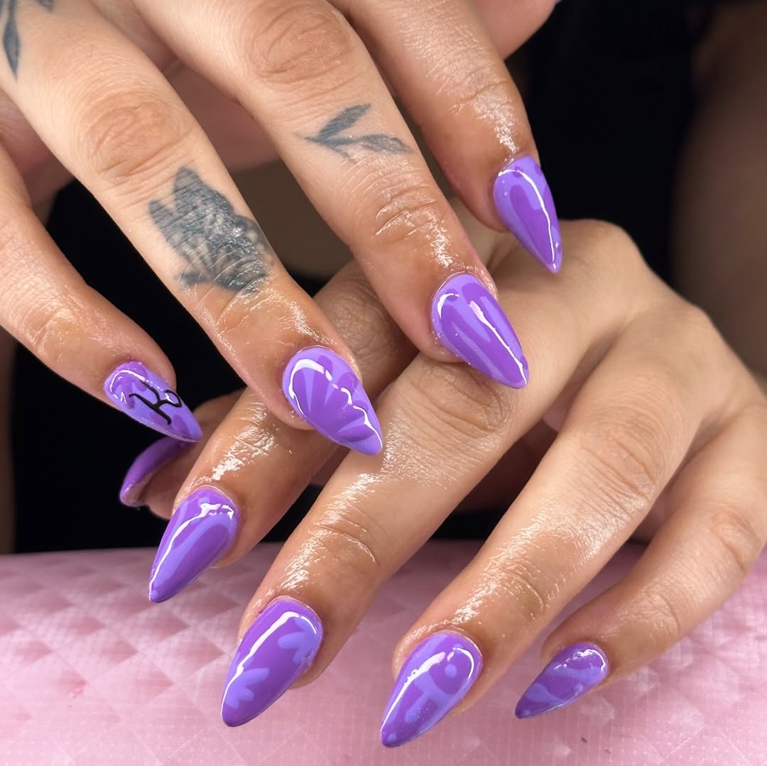 Vibrant Purple Heart Swirl Stiletto Nails