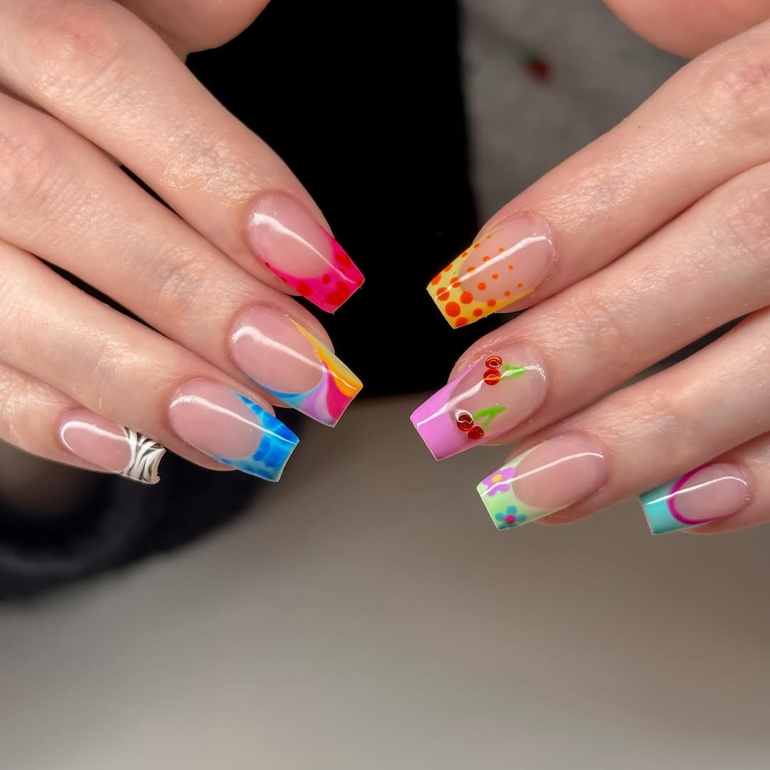 Vibrant Rainbow Abstract French Tips with Cute Accents