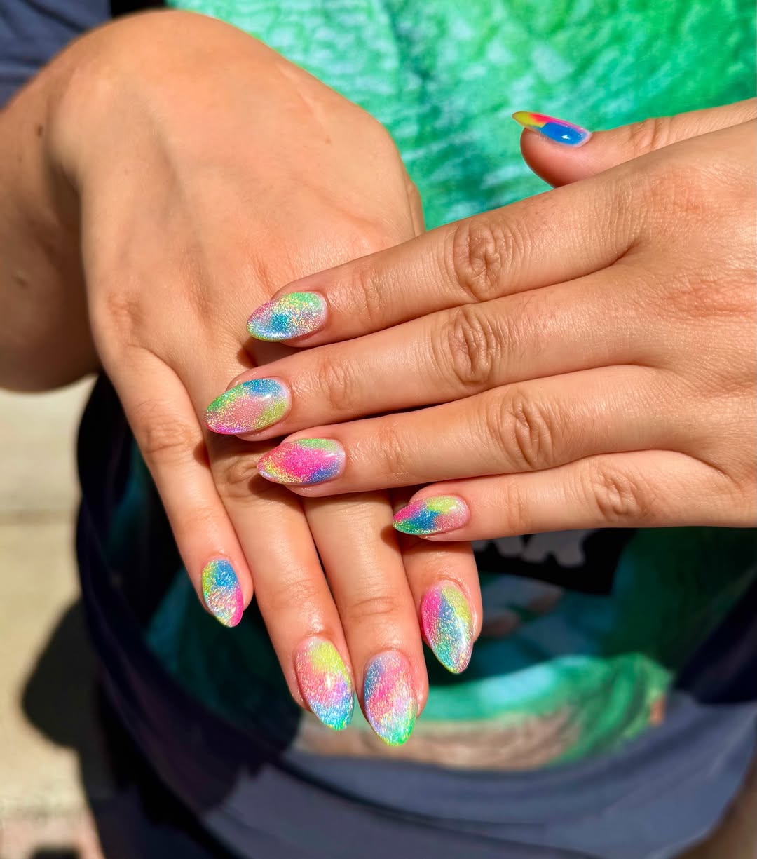 Vibrant Rainbow Cat Eye Almond Nails