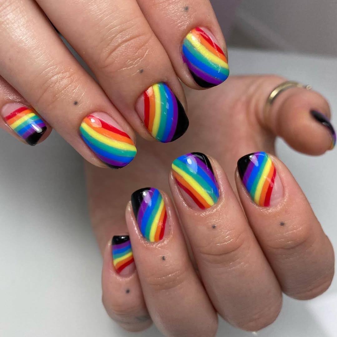 Vibrant Rainbow Stripe Nails with Black Accent