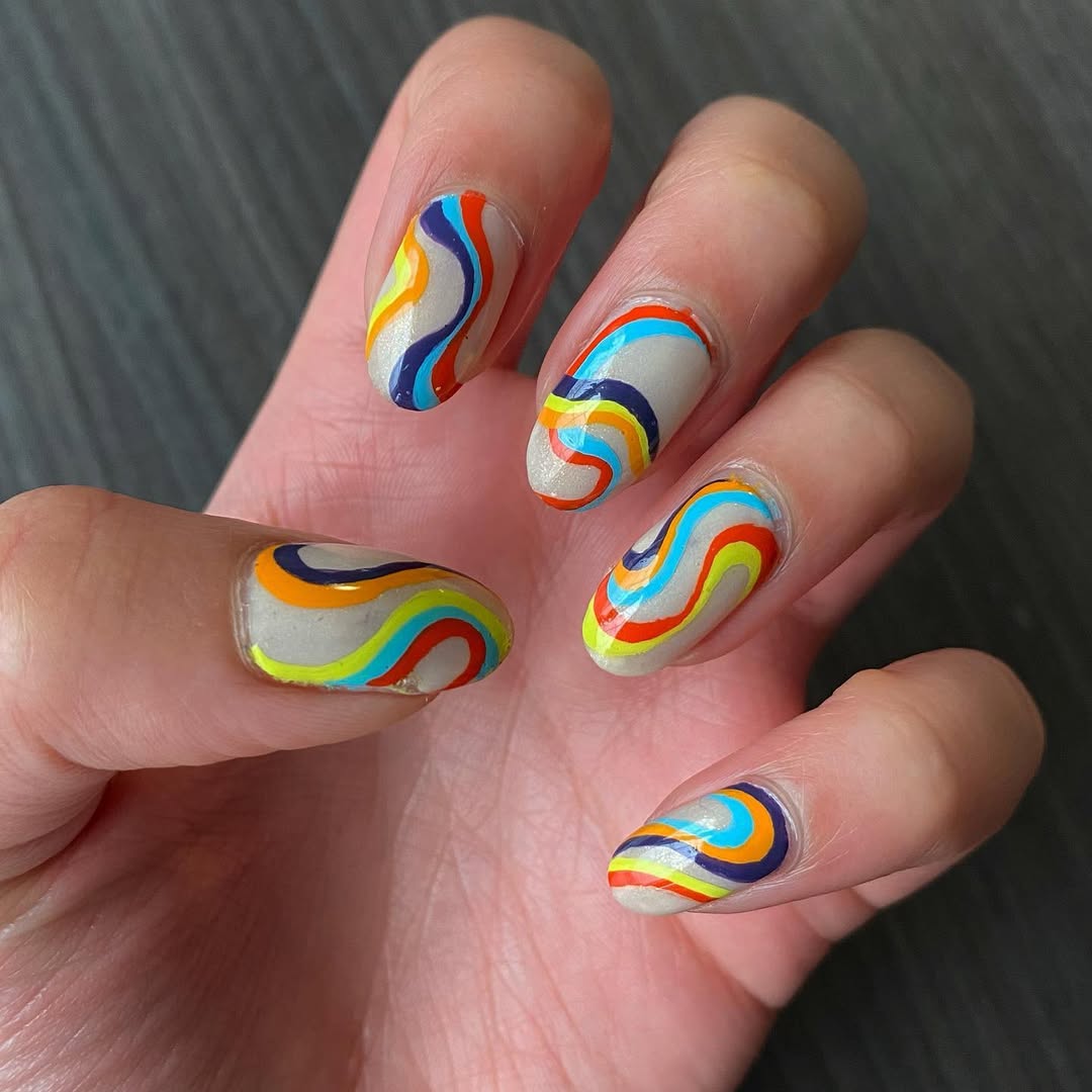 Vibrant Rainbow Wavy Swirl Oval Nails