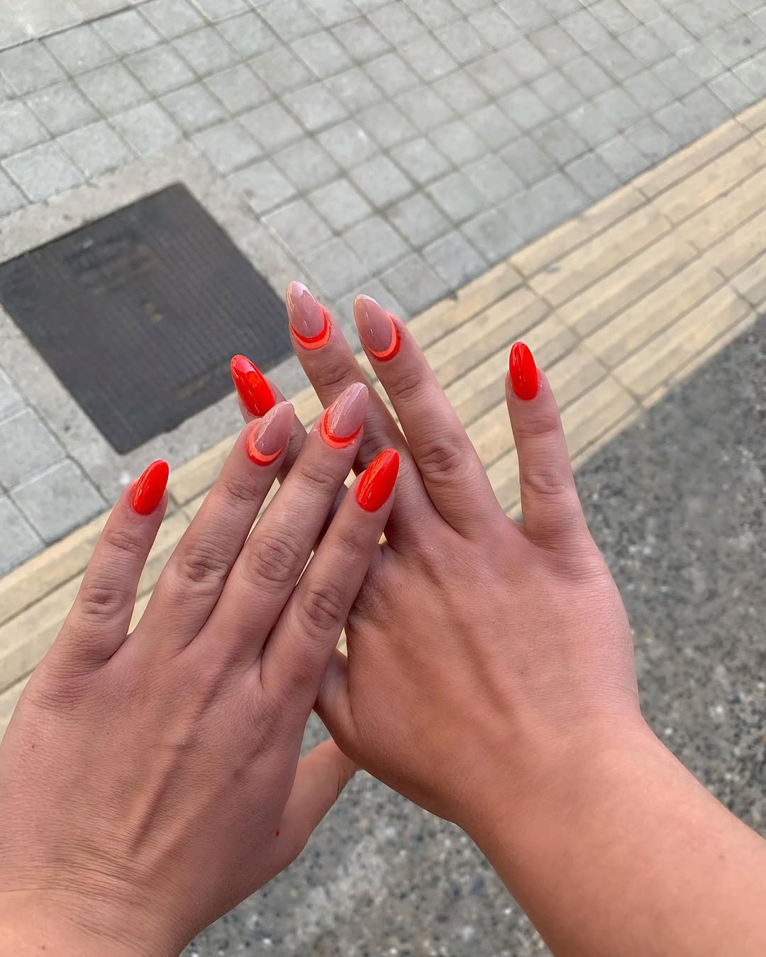 Vibrant Red And Nude Almond Abstract French Tips