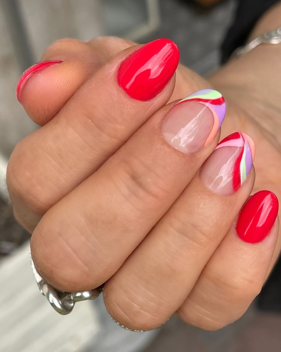Vibrant Red And Swirl Summer Almond Nails