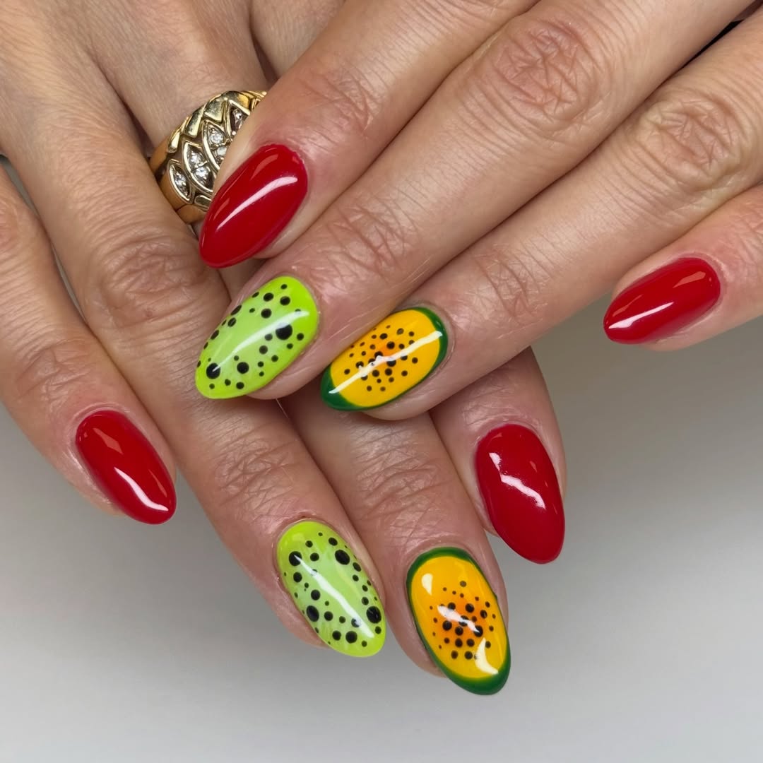 Vibrant Red and Tropical Fruit Accent Nails