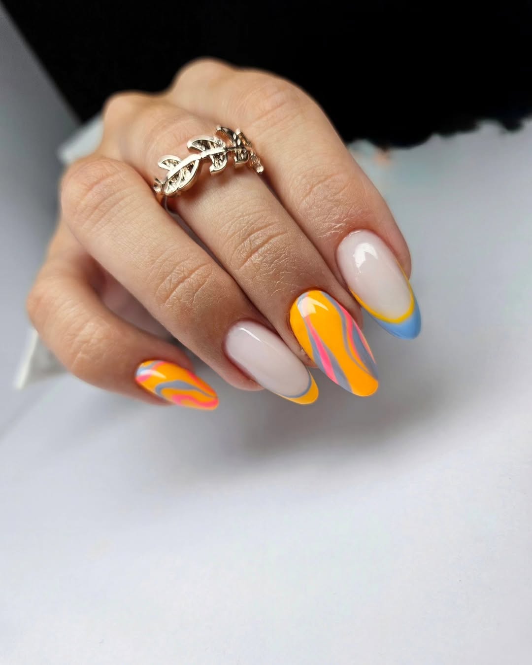 Vibrant Swirl Almond Accent French Tips