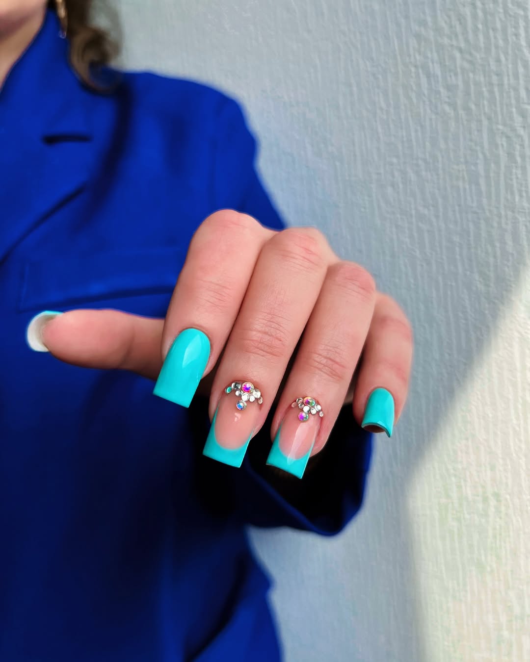 Vibrant Teal French Tips With Rhinestone Cluster Art