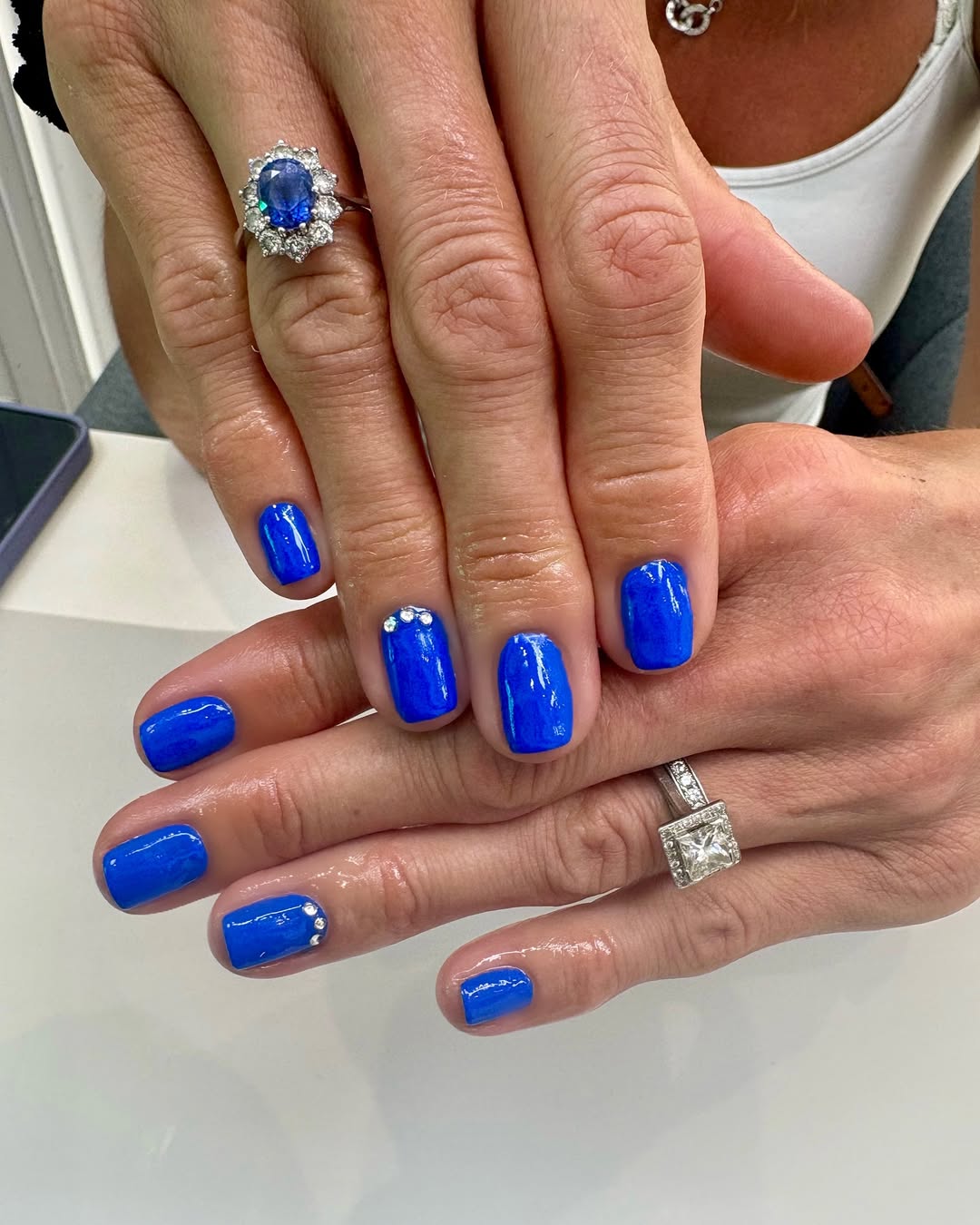 Vivid Blue Glossy Short Squoval Nails With Rhinestones
