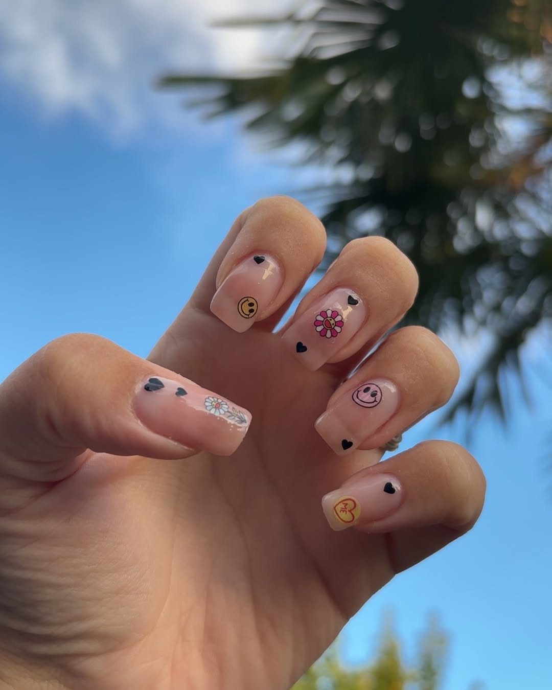 Whimsical Decal Nails With Black Hearts
