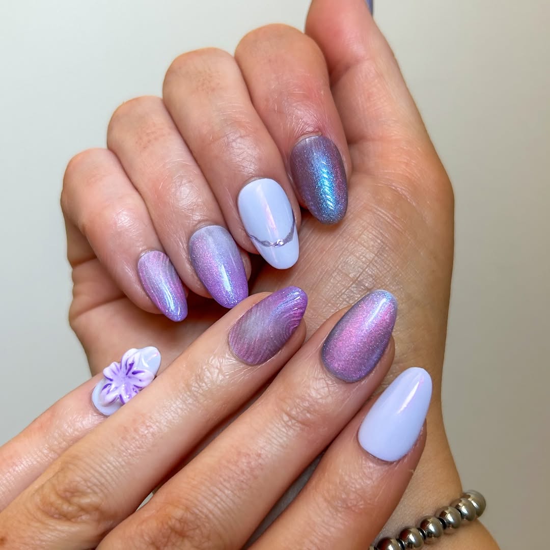 Whimsical Lilac Swirl Cat Eye Almond Nails