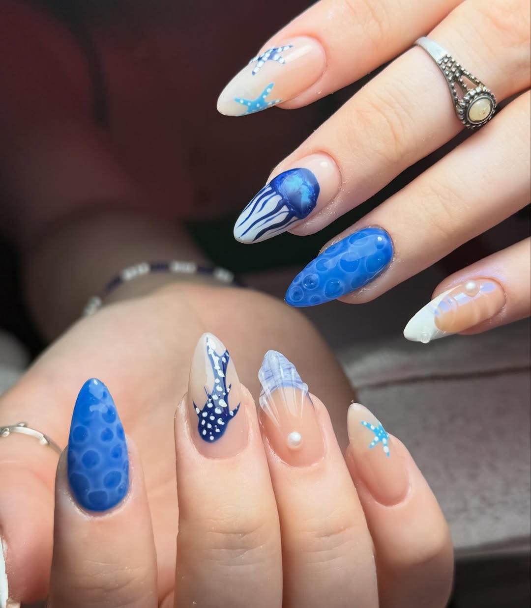 Whimsical Ocean Blue Almond Sculpted Nail Art