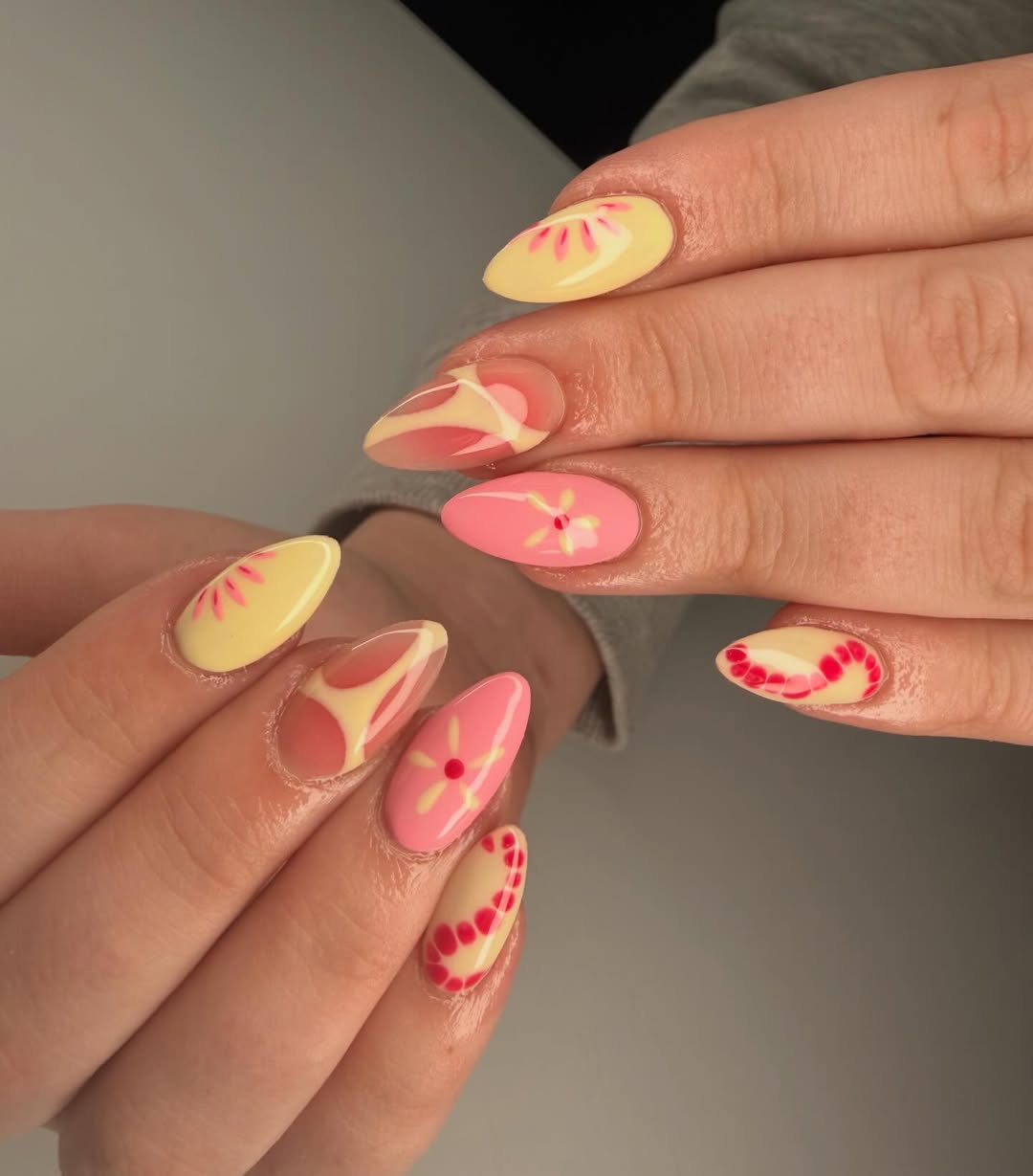 Whimsical Pastel Swirl and Floral Almond Nails