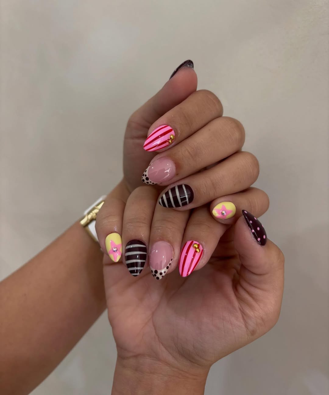 Whimsical Pattern Mix Almond Nails with Studs