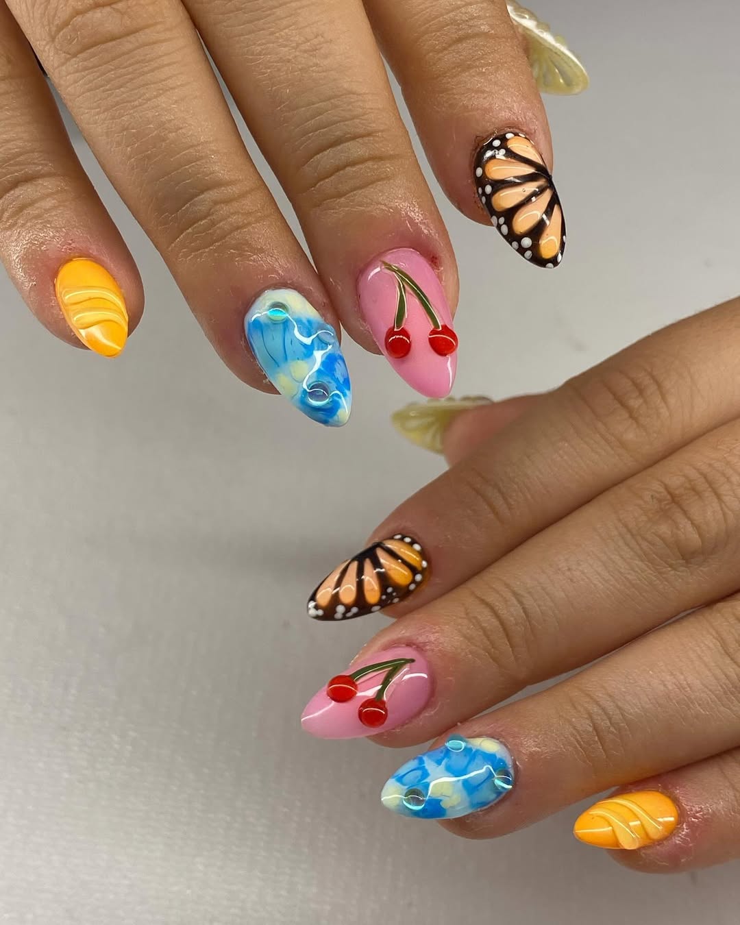 Whimsical Summer Mix And Match Almond Nails