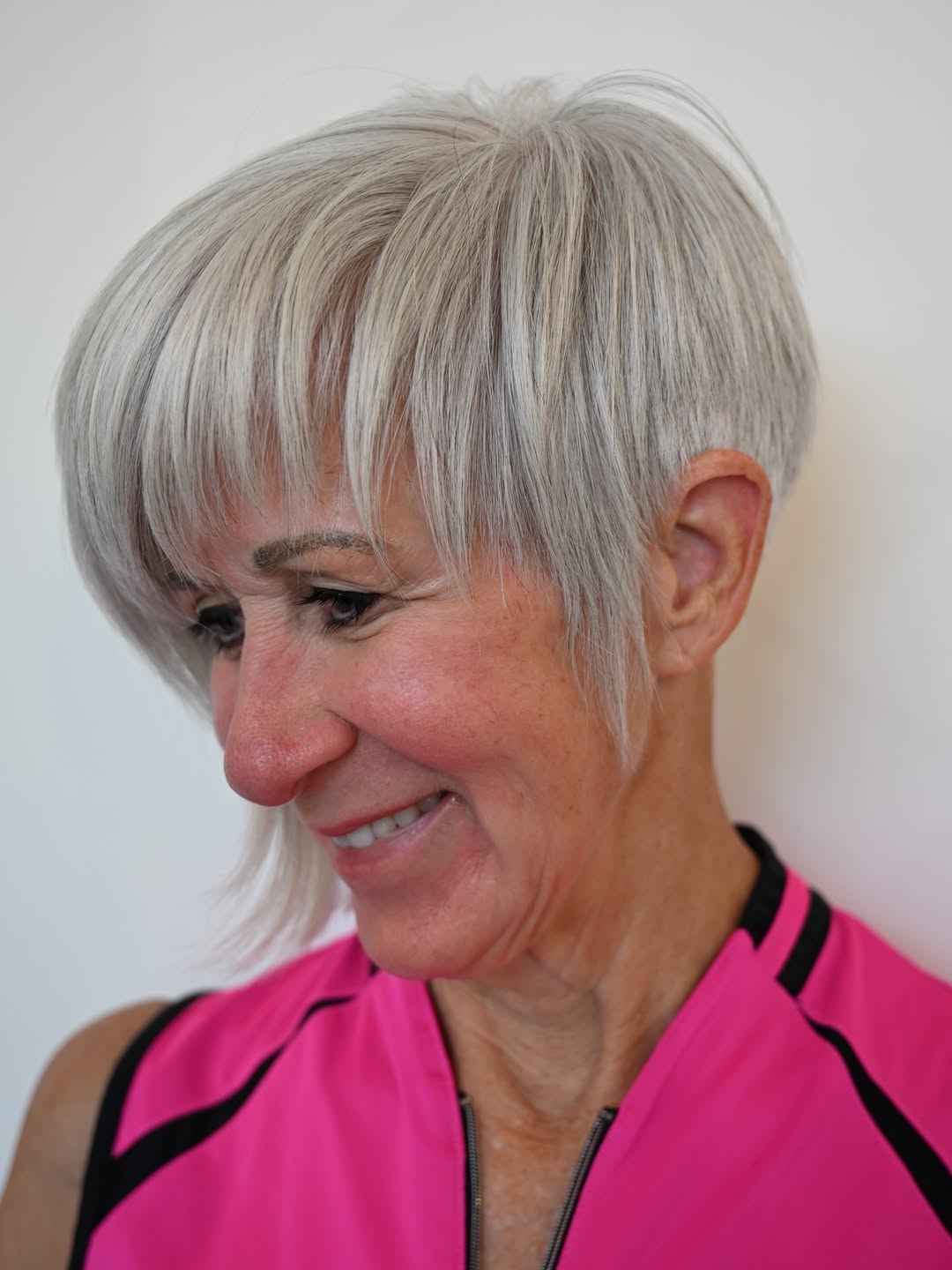 Ageless Silver Pixie With Side-Swept Bangs