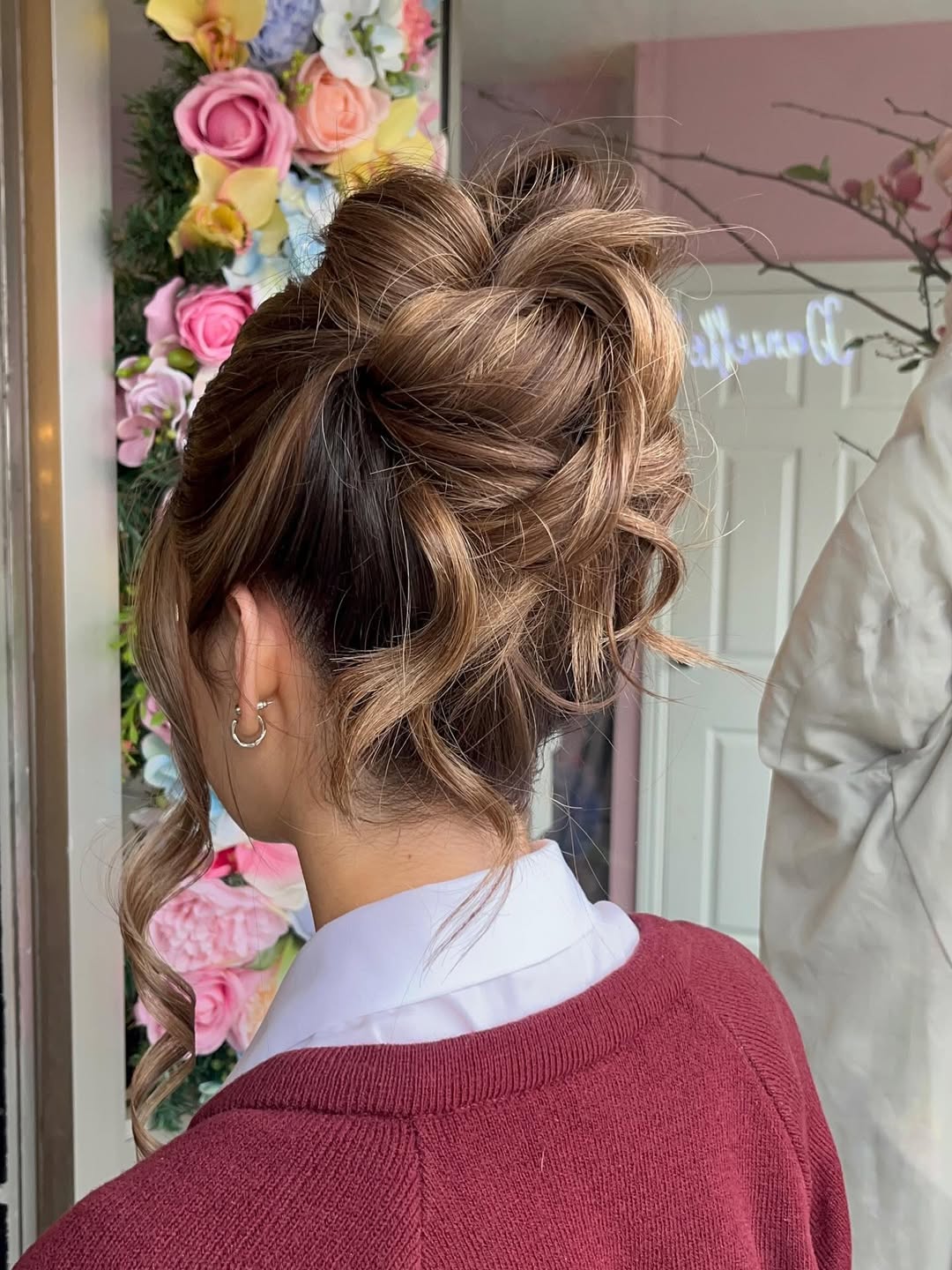 Beachy Waves Messy Bun With Face-Framing Tendrils