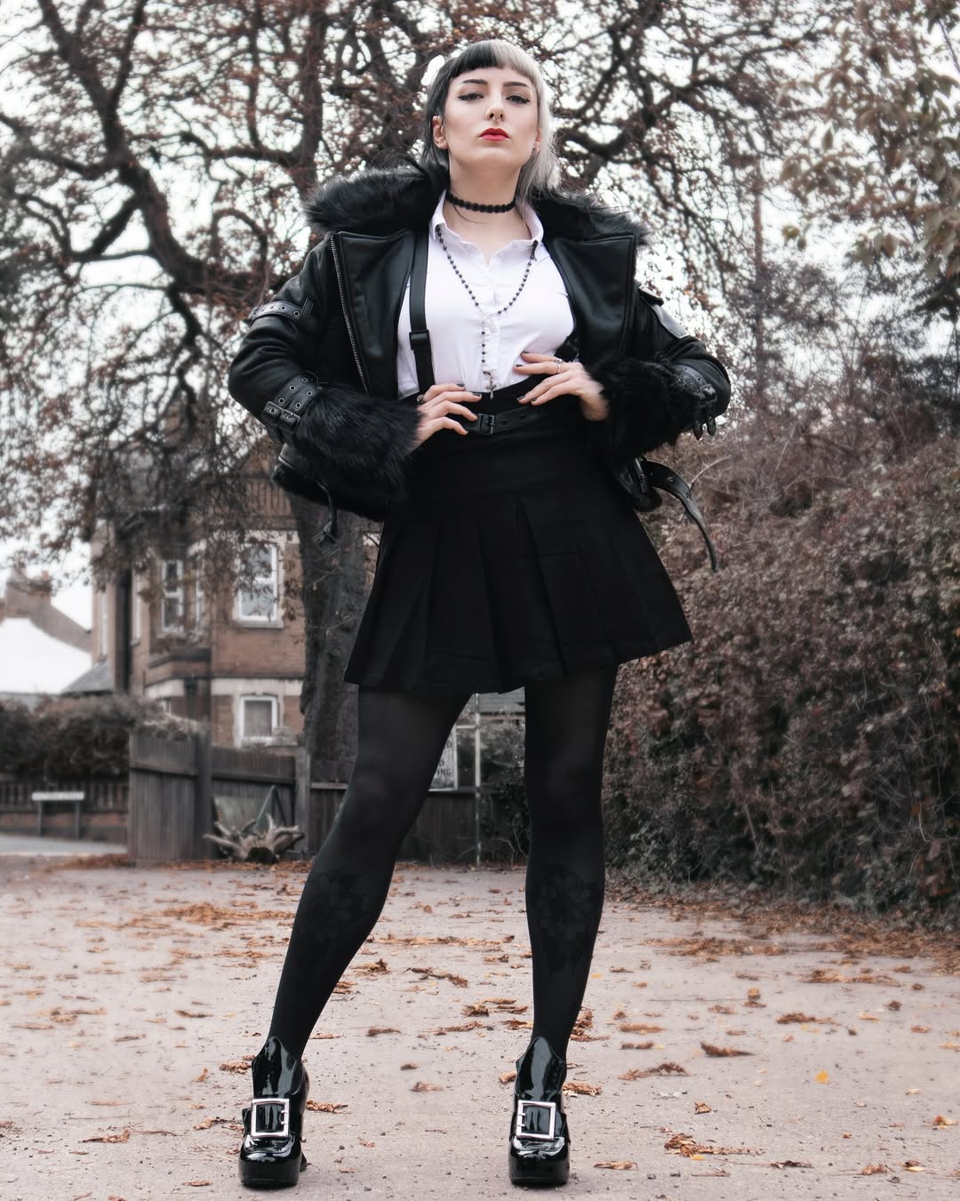 Black Faux Fur Moto Jacket With Pleated Skirt