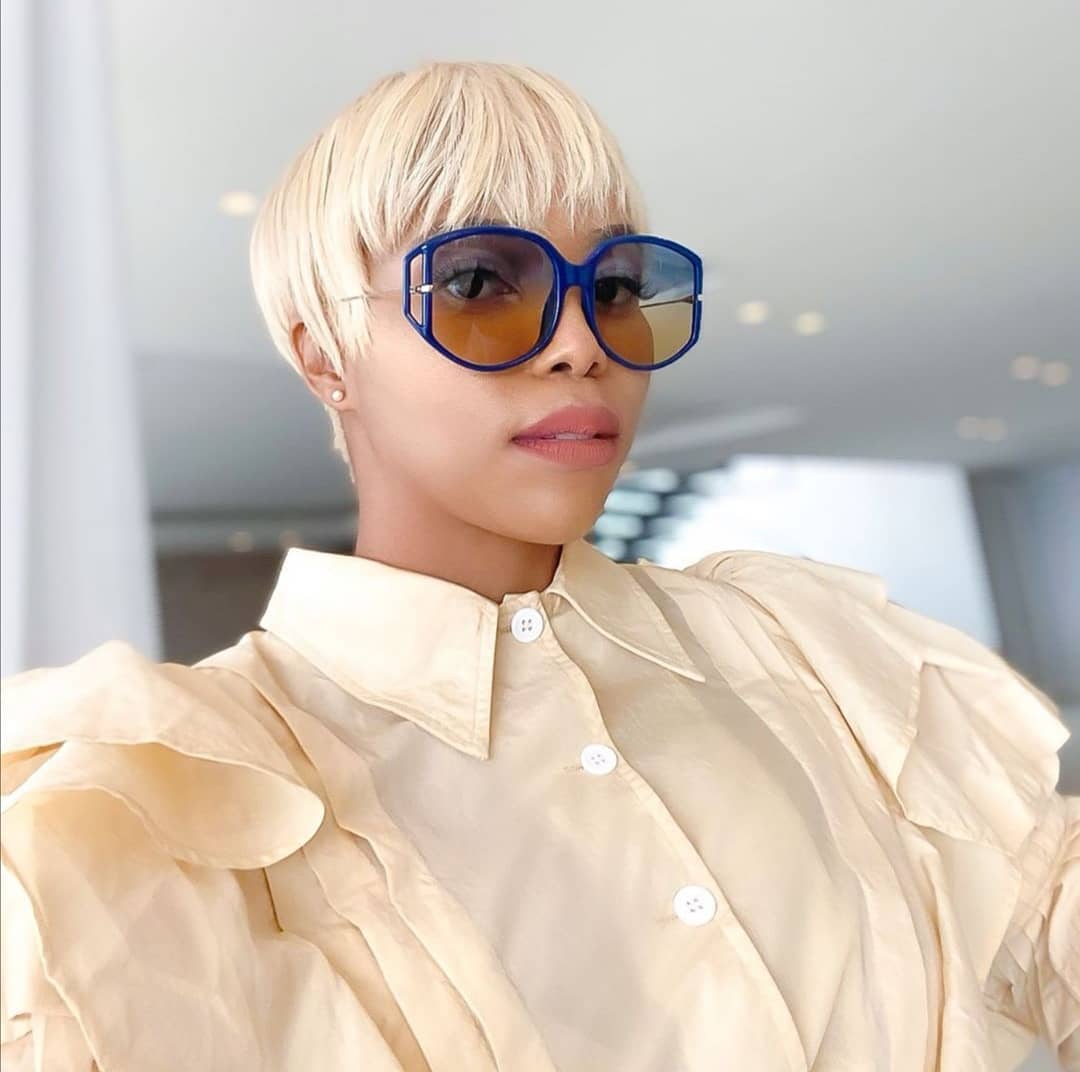 Blonde Pixie Cut With Blunt Bangs