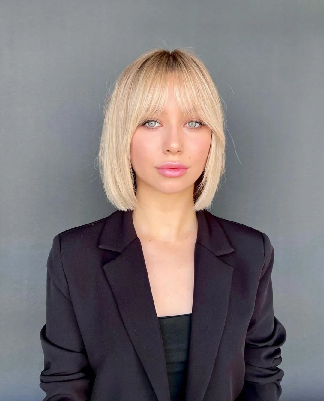 Blunt Platinum Bob With Wispy Bangs