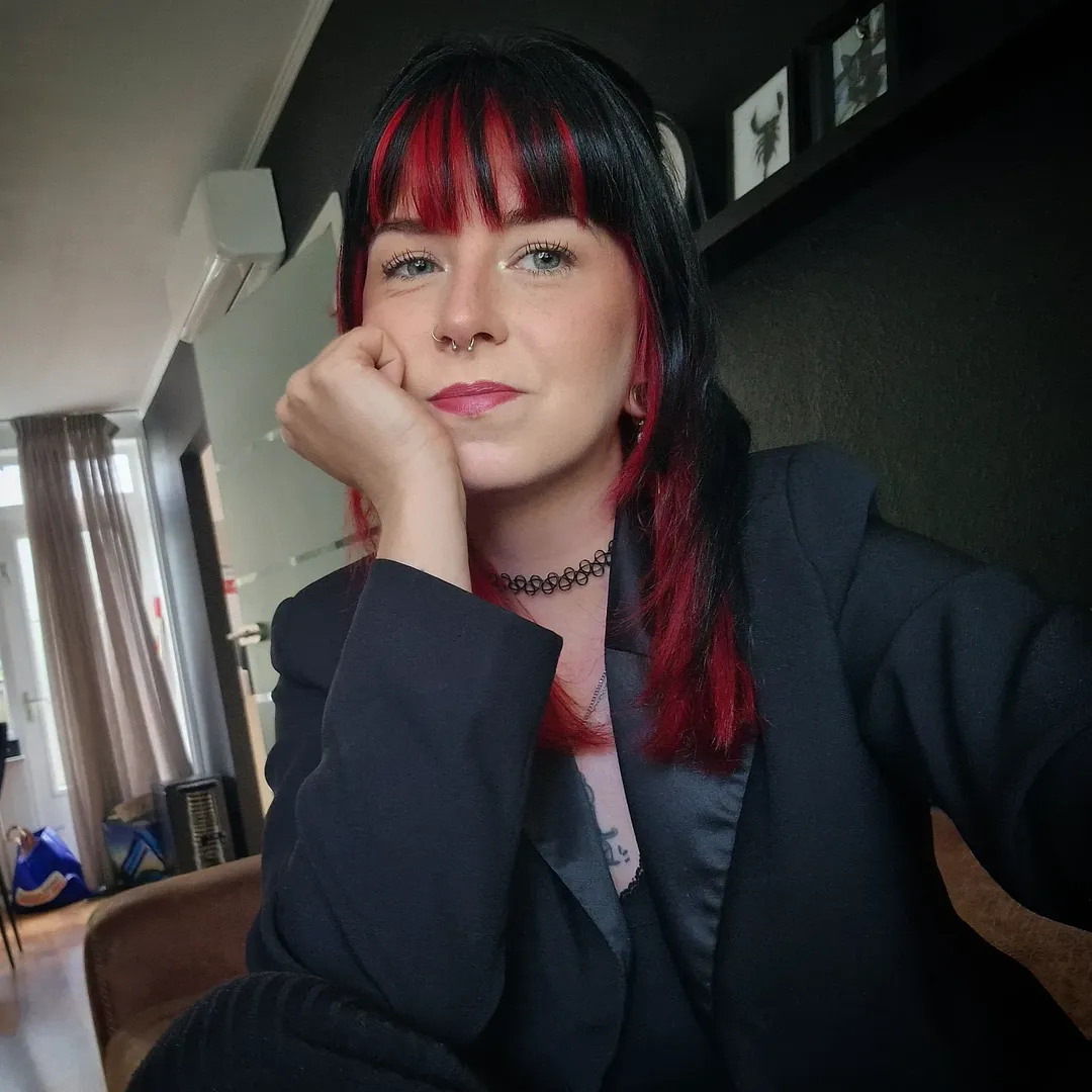 Bold Black and Red Two-Toned Hair with Blunt Bangs