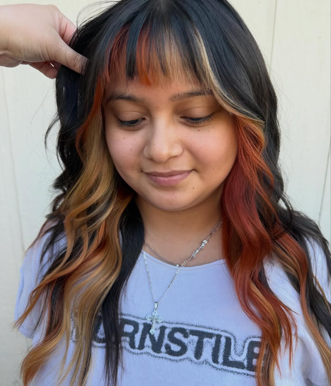 Bold Calico Hair Color With Curtain Bangs