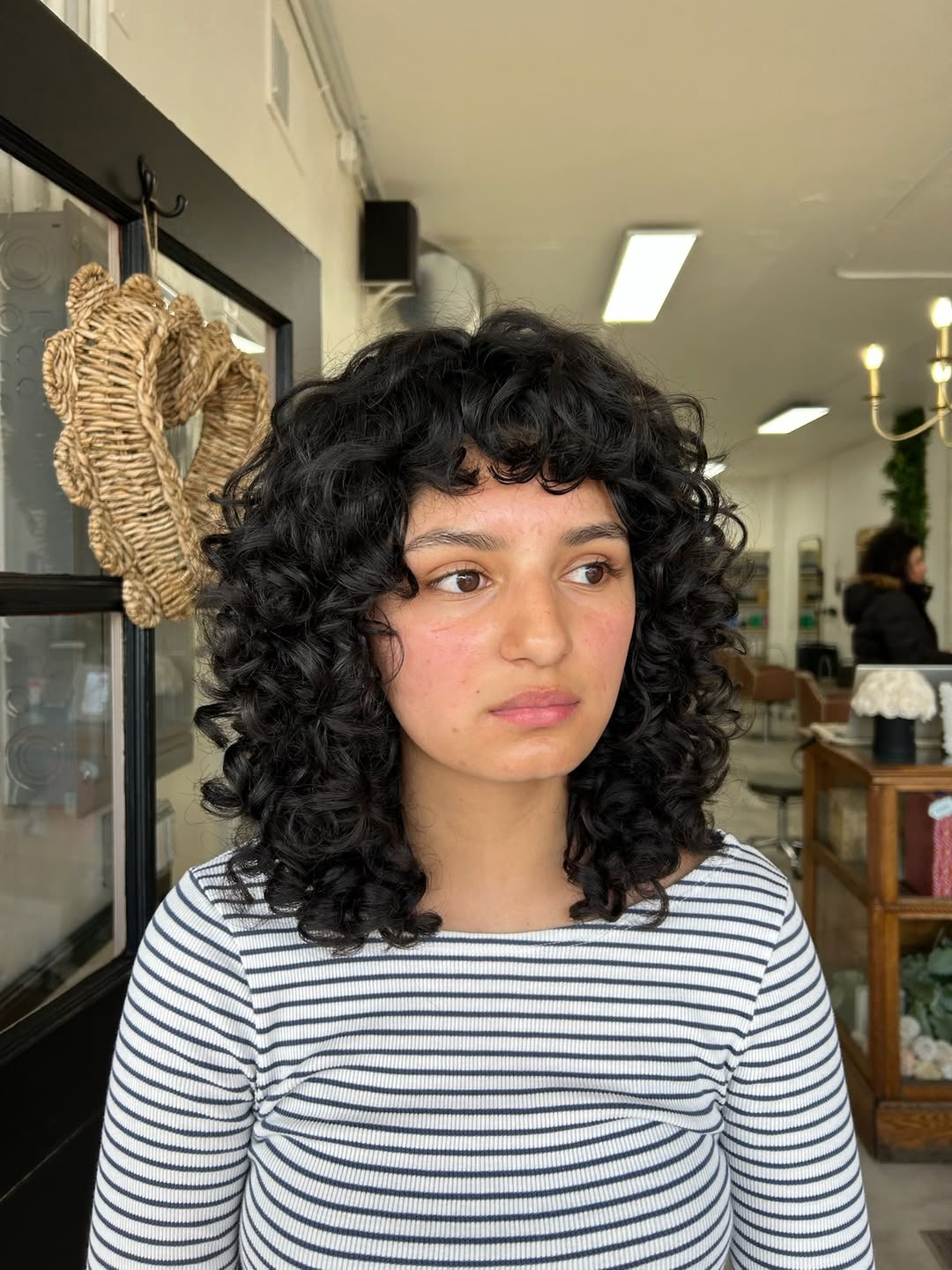 Bold Curly Shag With Full Fringe