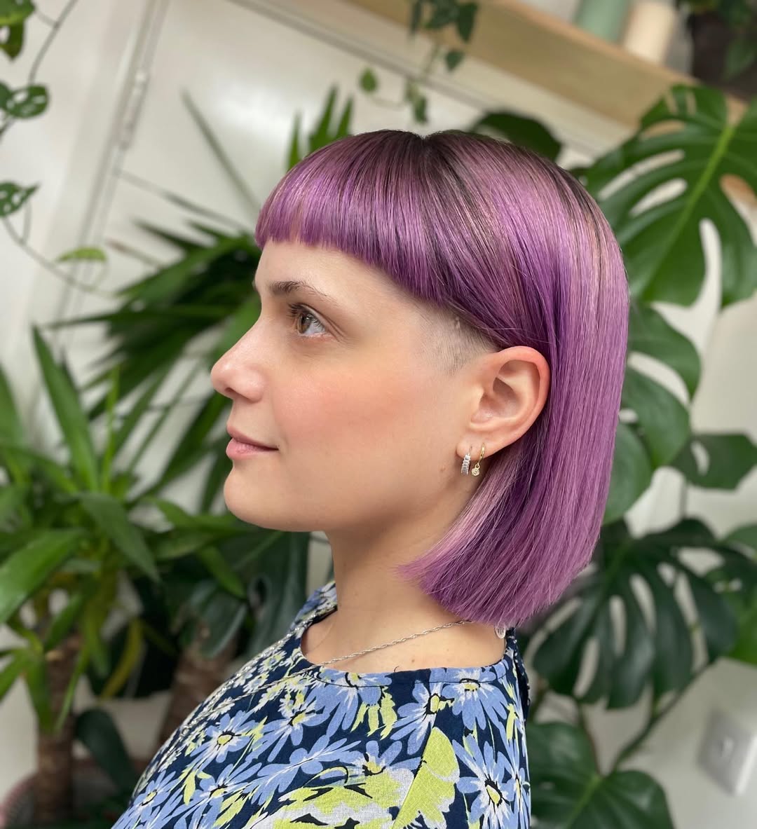 Bold Purple Undercut Bob With Blunt Bangs