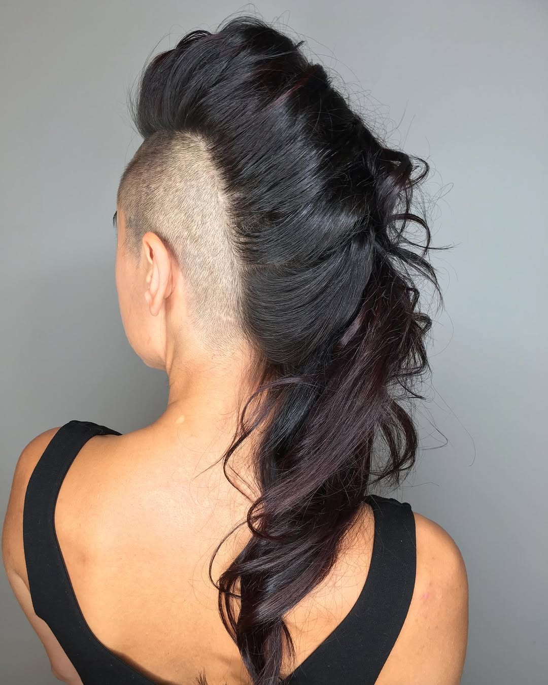 Bold Undercut Mohawk With Voluminous Waves