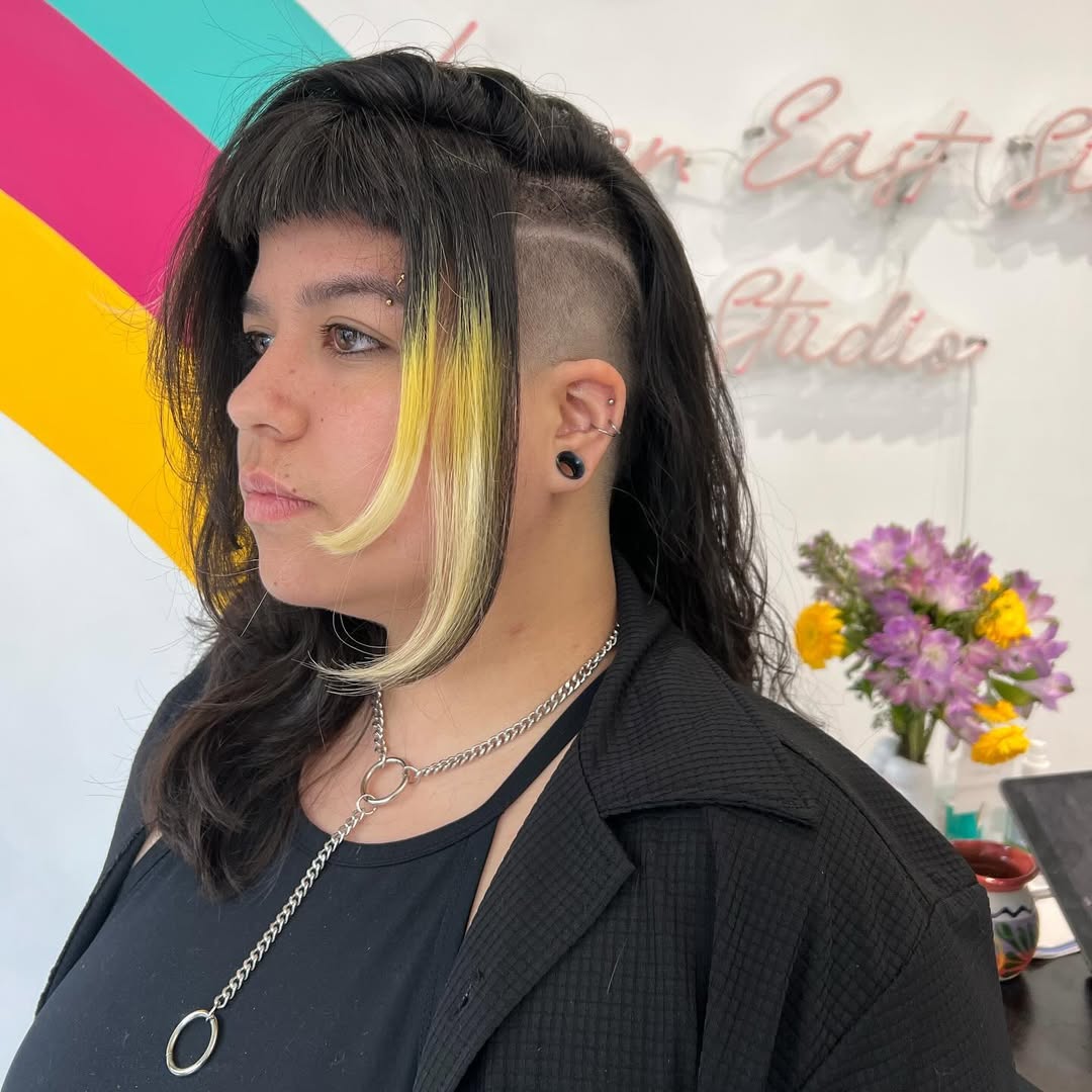 Bold Undercut With Chunky Blonde Face-Framing Strands