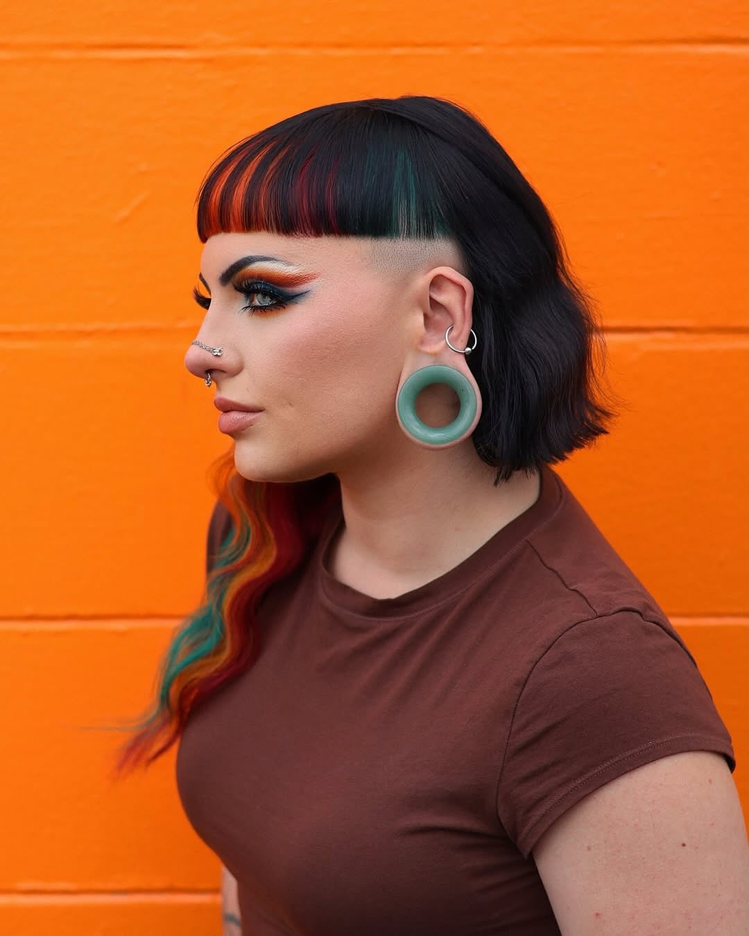Bold Undercut With Vibrant Rainbow Highlights