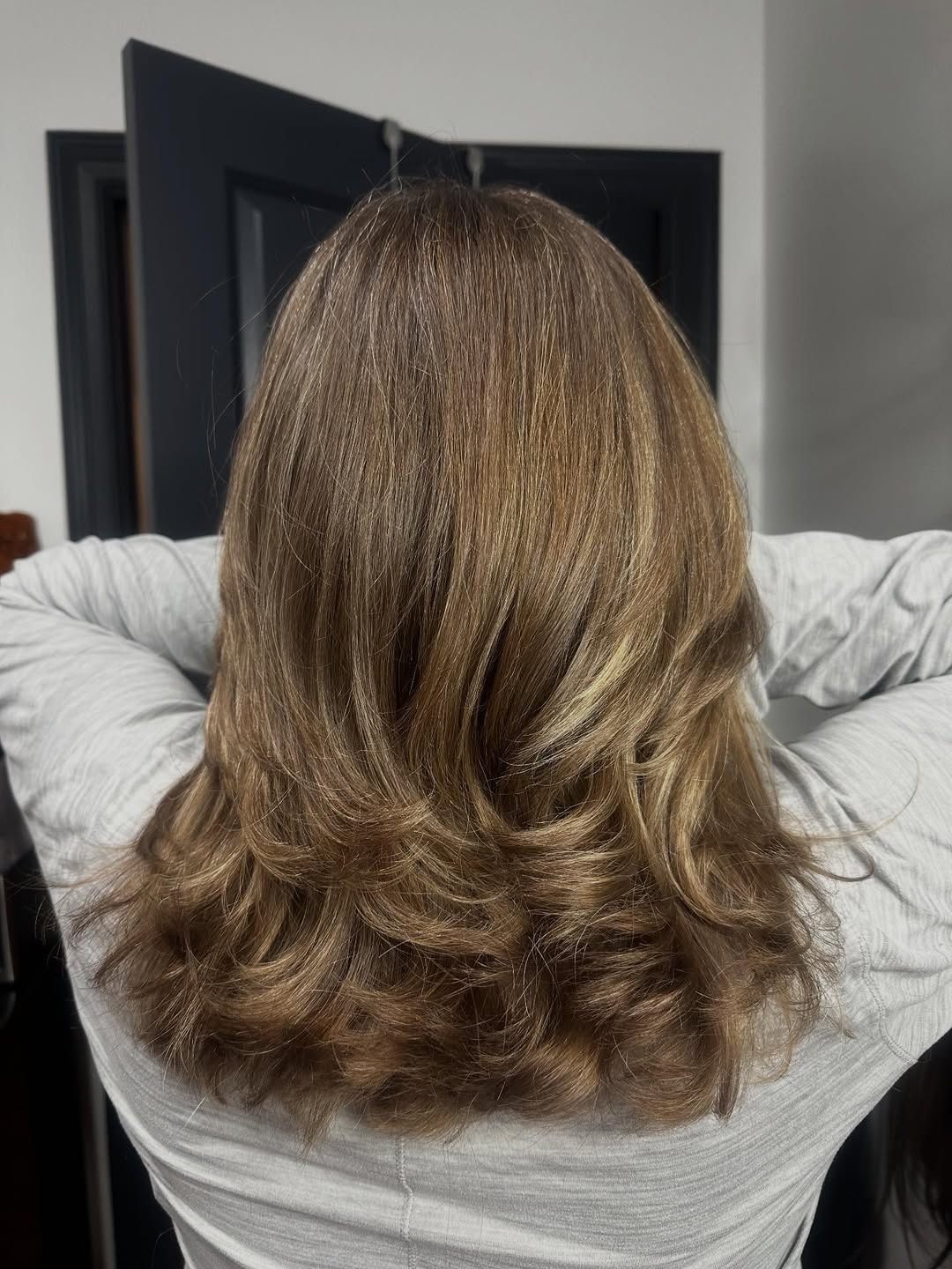 Bouncy Blowout With Blended Caramel Highlights