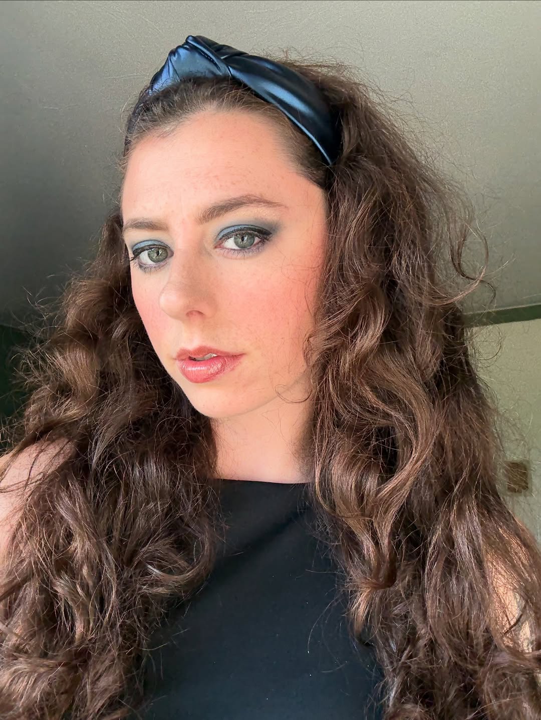Bouncy Brunette Curls With Shiny Navy Headband