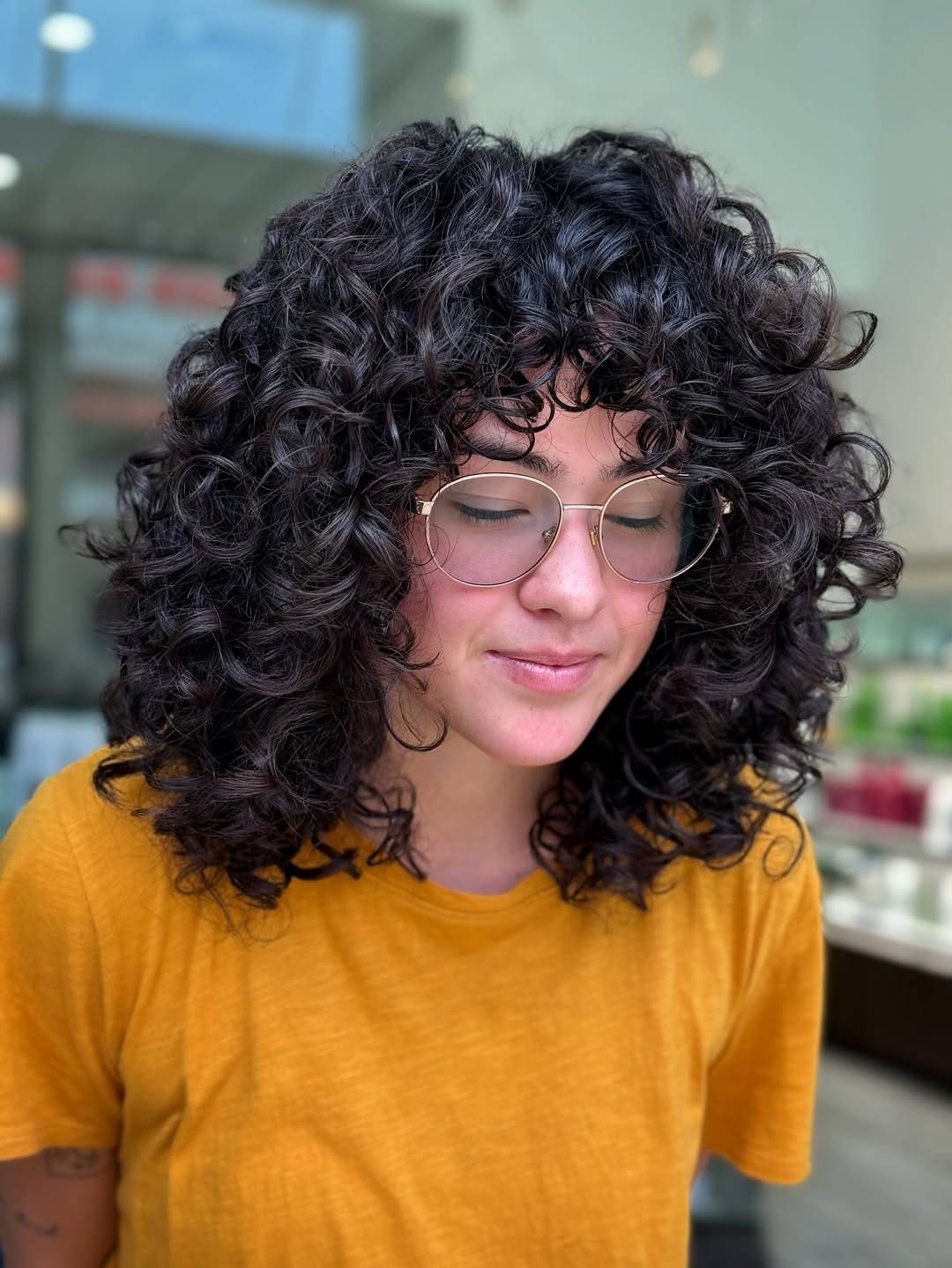 Bouncy Curly Bob With Full Fringe