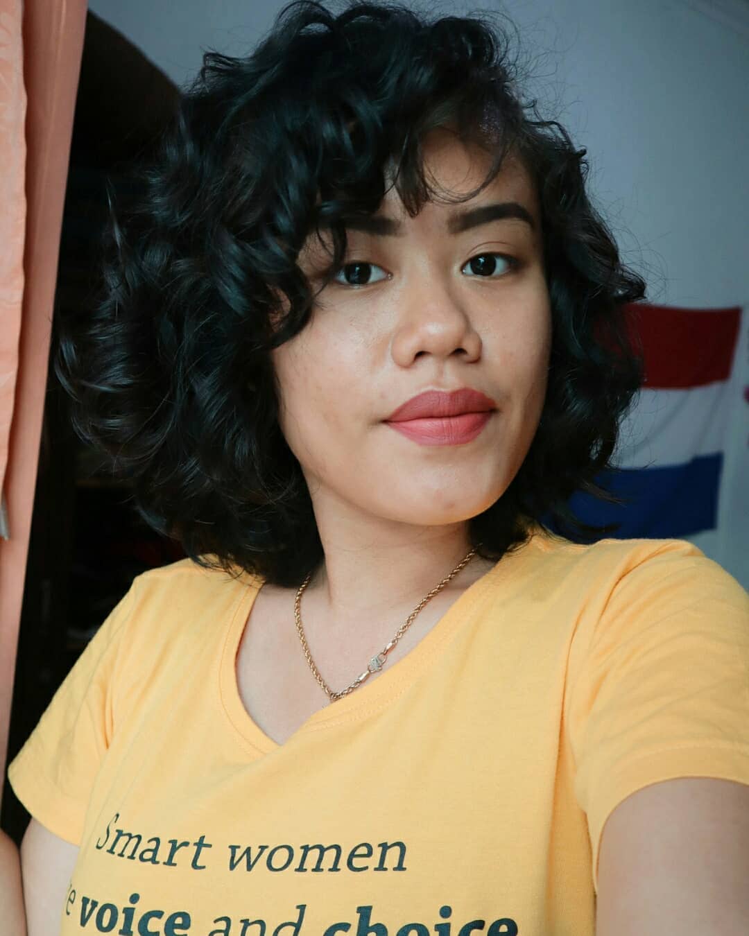 Bouncy Dark Curly Bob With Bangs