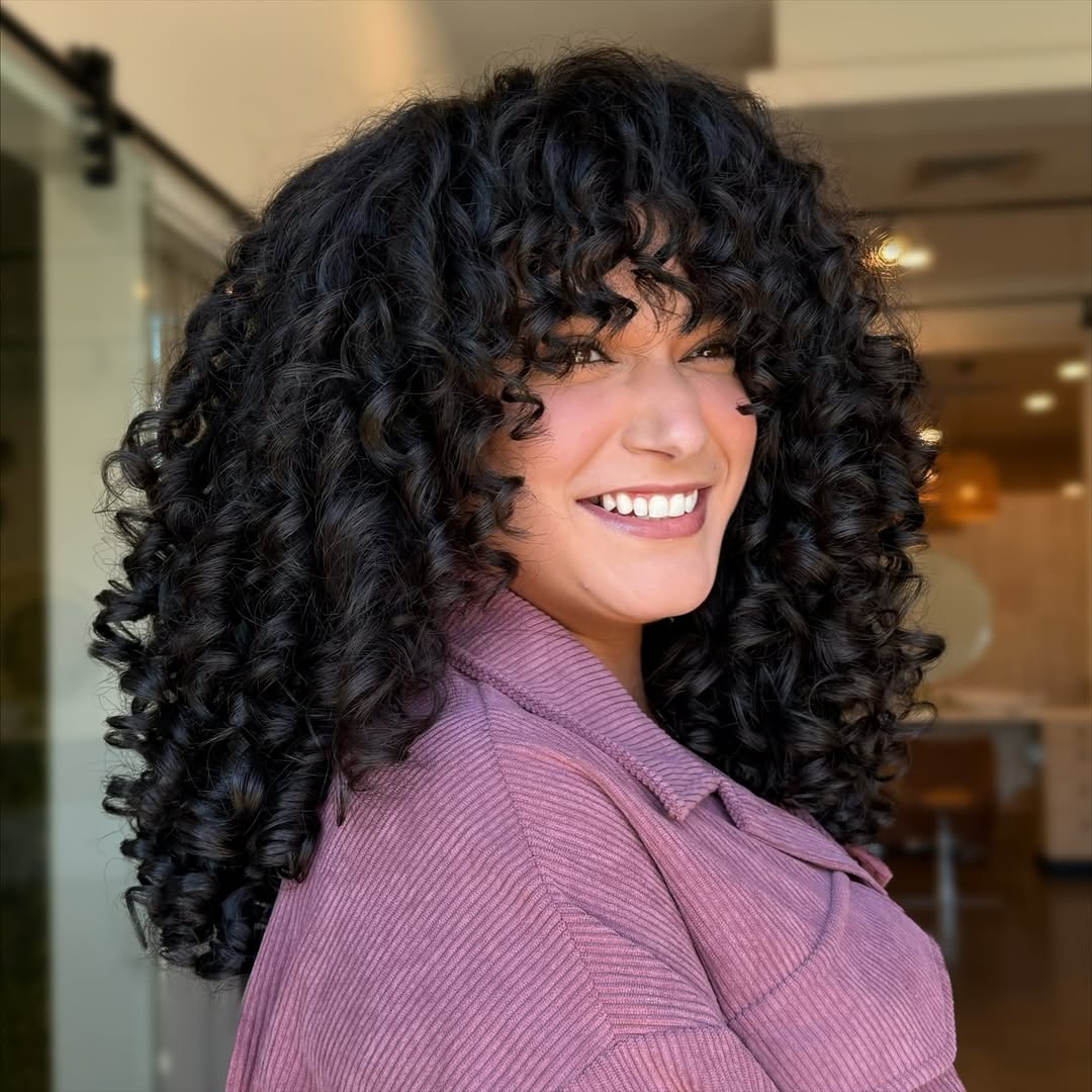 Bouncy Voluminous Dark Curly Shag With Bangs
