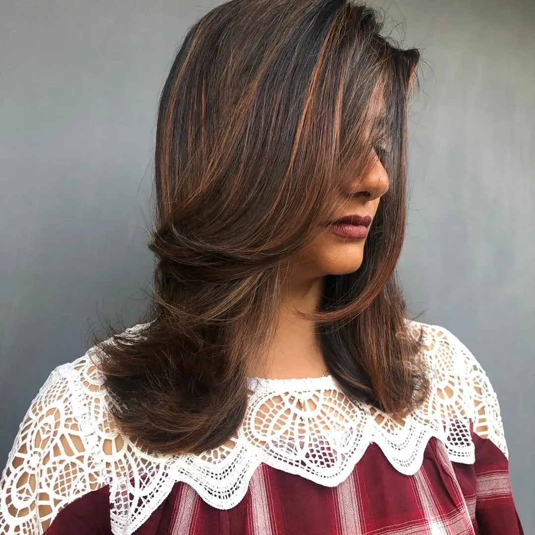 Caramel Highlights On Layered Shoulder-Length Hair
